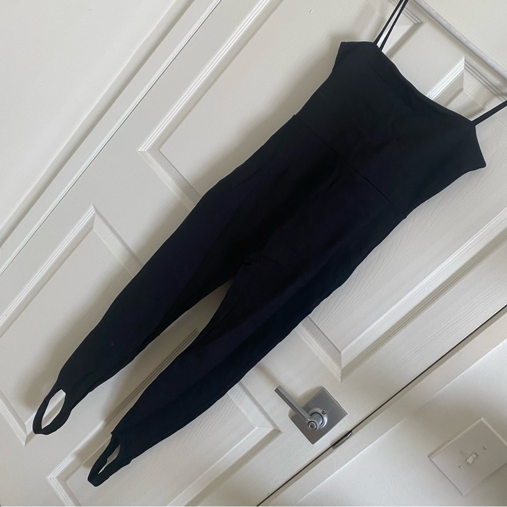 LESET Black Minimalist Jumpsuit with 90s Spaghetti Straps + Stirrup Leggings